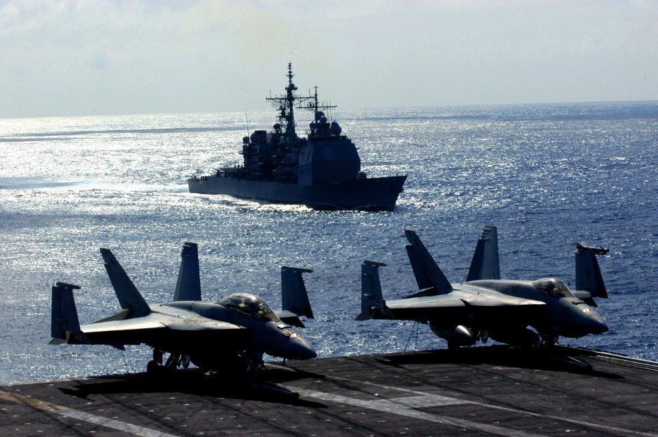 US Navy 070407-N-1525H-087 Guided-missile cruiser USS Princeton (CG 58) approaches the port side of nuclear-powered aircraft carrier USS Nimitz (CVN 68) to take position for a live satellite broadcast to PETCO Park for the San