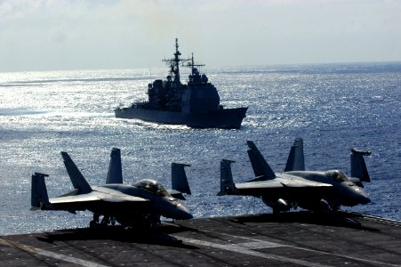 US Navy 070407-N-1525H-087 Guided-missile cruiser USS Princeton (CG 58) approaches the port side of nuclear-powered aircraft carrier USS Nimitz (CVN 68) to take position for a live satellite broadcast to PETCO Park for the San