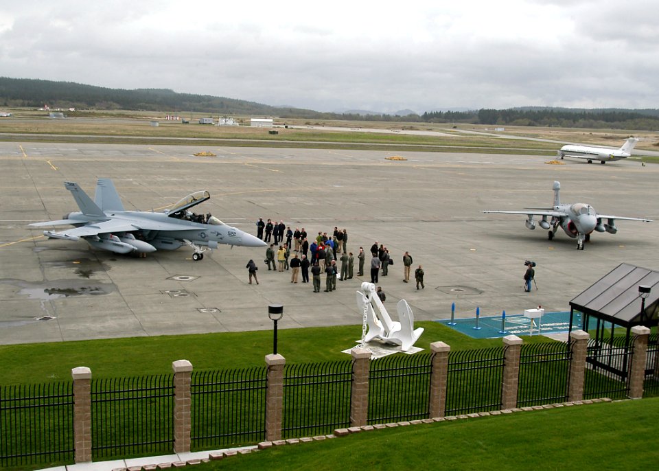 US Navy 070409-N-6247M-038 EA-18G Growler is parked on the airfield next to an EA-6B Prowler