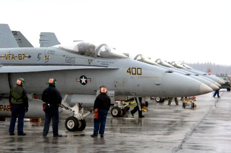US Navy 070412-F-3488S-011 Navy crew members from Strike Fighter Squadron (VFA) 87 ready an F-A-18C prior to a mission during Red Flag-Alaska 07-1