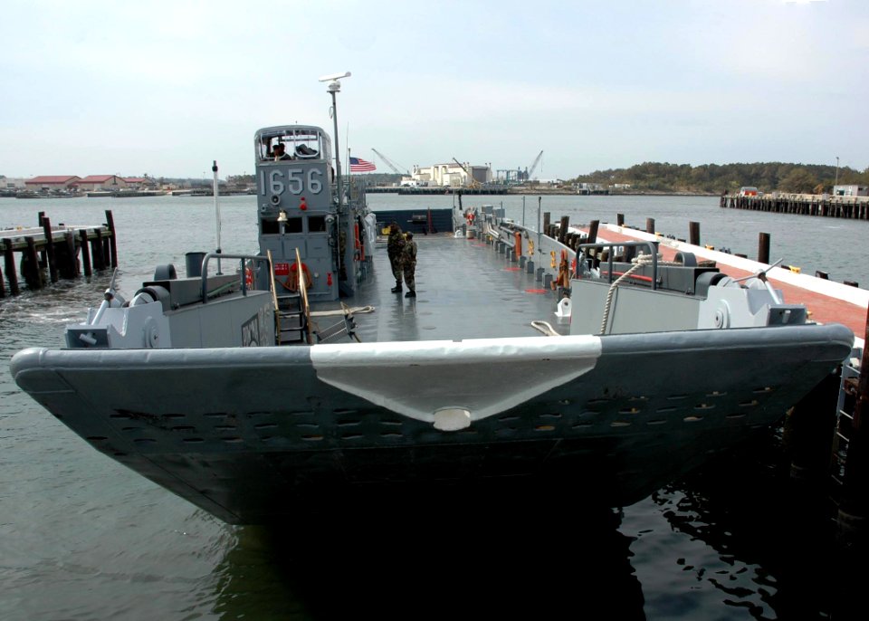US Navy 070411-N-8547M-076 Landing Craft Utility (LCU) 1656 assigned to Assault Craft Unit (ACU) 2 performs pier side maneuvers during a training exercise on board Naval Amphibious Base Little Creek