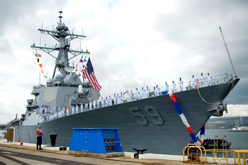 US Navy 070407-N-4856G-031 A Sailor stands ready to receive the lines from the guided missile destroyer USS Russell (DDG 59) as the ship returns to Naval Station Pearl Harbor from a three-month deployment