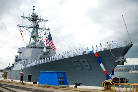 US Navy 070407-N-4856G-031 A Sailor stands ready to receive the lines from the guided missile destroyer USS Russell (DDG 59) as the ship returns to Naval Station Pearl Harbor from a three-month deployment