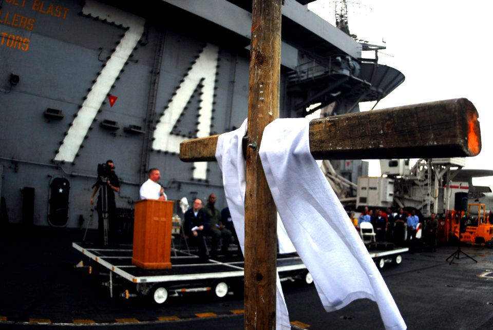 US Navy 070408-N-9928E-046 Cmdr. William Kennedy, the ship's chaplain, presides over the Easter Sunrise Service on the flight deck of Nimitz-class aircraft carrier USS John C. Stennis (CVN 74)