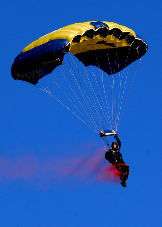 US Navy 070417-N-2903M-010 Senior Chief Special Warfare Operator Lance Leafers of the Navy Parachute Team arrives on the football field during a performance at North Bullitt High School