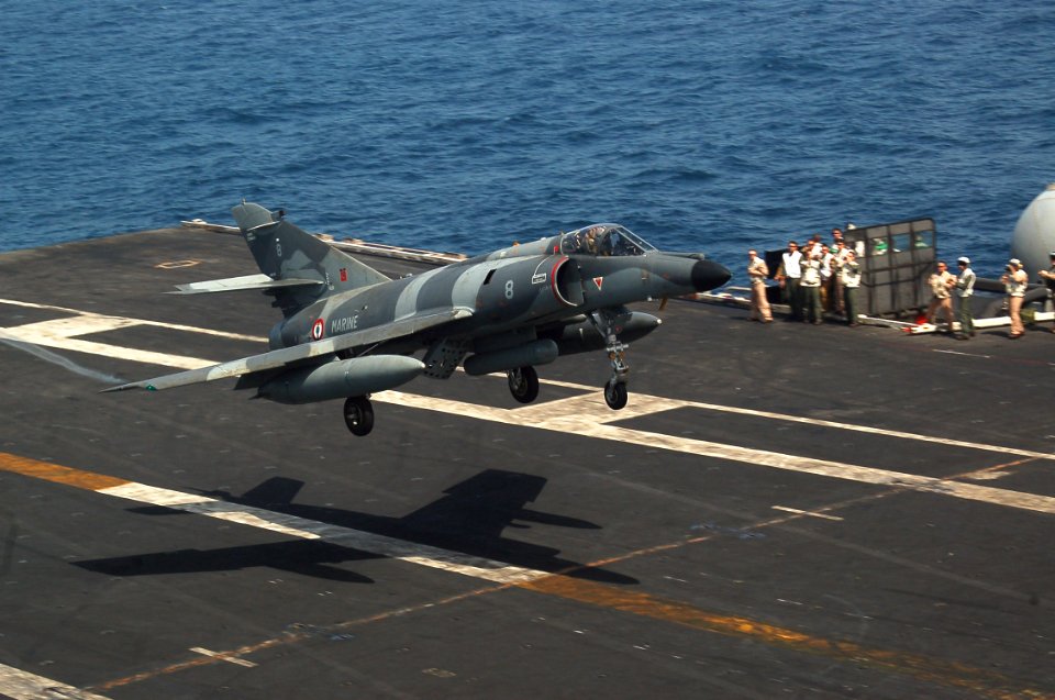 US Navy 070412-N-7498L-018 A French Super-Etendard from the nuclear-powered aircraft carrier French Navy Ship Charles de Gaulle (R 91) performs a touch-and-go landing on the flight deck of the Nimitz-class aircraft carrier USS
