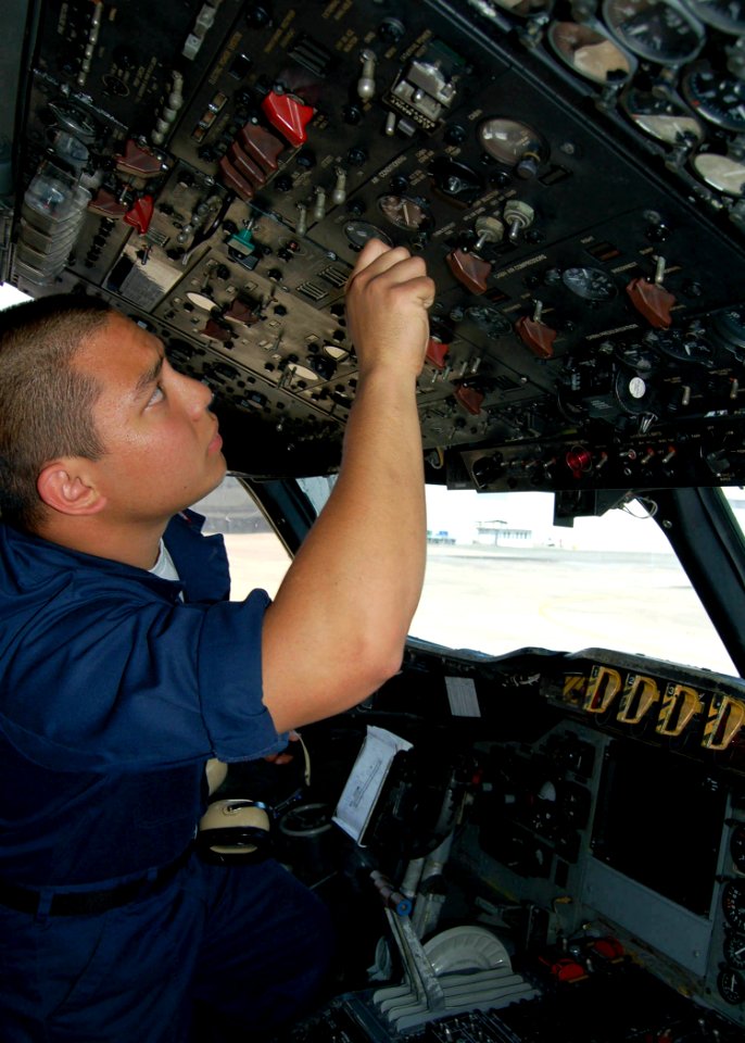 US Navy 070416-N-3855M-001 Aviation Electronics Technician 3rd Class Jose M. Cruz, assigned to Consolidated Maintenance Organization (CMO) in support of the
