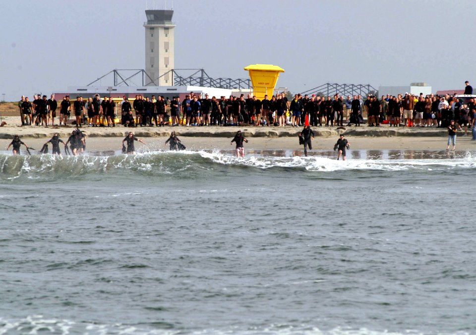 US Navy 070412-N-9604C-004 Rescue swimmers make a splash as they plunge into the water for the open ocean swim event at the annual Naval Helicopter Aviation (NHA) Symposium 2007 Aircrew Competition