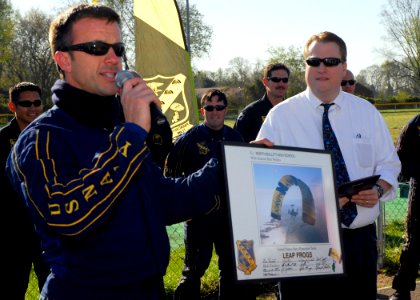 US Navy 070417-N-2903M-016 Navy Parachute Team commanding officer Lt. Cmdr. Robert Kaminski presents North Bullitt High School principal William Schultz with a plaque after a performance at the school