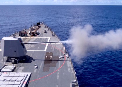 US Navy 070417-N-5253W-002 Smoke billows from the five-inch deck gun aboard the Arleigh Burke-class guided-missile destroyer USS Lassen during a calibration test fire