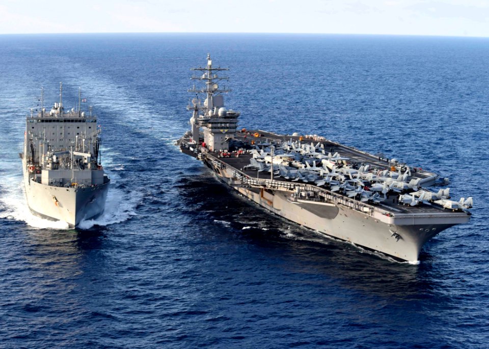 USS Dwight D. Eisenhower conducts a replenishment-at-sea with USNS William McLean (25530952203)