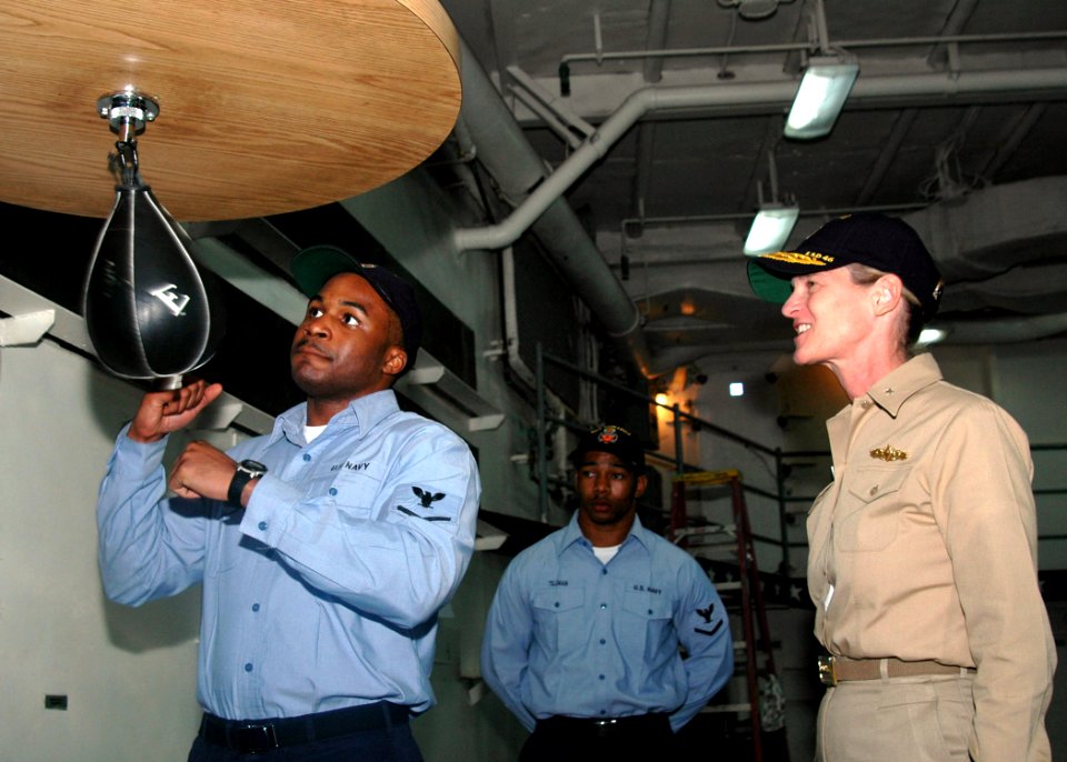 US Navy 070417-N-6710M-031 Information System Technician 3rd Class Anthony Seay demonstrates the proper way to hit a speed bag