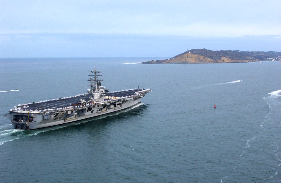 US Navy 070420-N-4776G-165 As Sailors man the rails, USS Ronald Reagan (CVN 76) passes by Point Loma before pulling into port