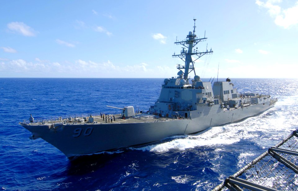 US Navy 070419-N-6326B-074 Guided-missile destroyer USS Chafee (DDG 90), transits alongside nuclear-powered aircraft carrier USS Nimitz (CVN 68) during a routine replenishment at sea (RAS)