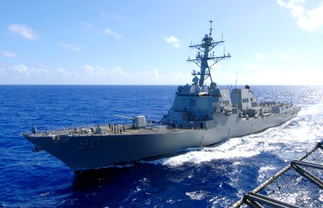 US Navy 070419-N-6326B-074 Guided-missile destroyer USS Chafee (DDG 90), transits alongside nuclear-powered aircraft carrier USS Nimitz (CVN 68) during a routine replenishment at sea (RAS)