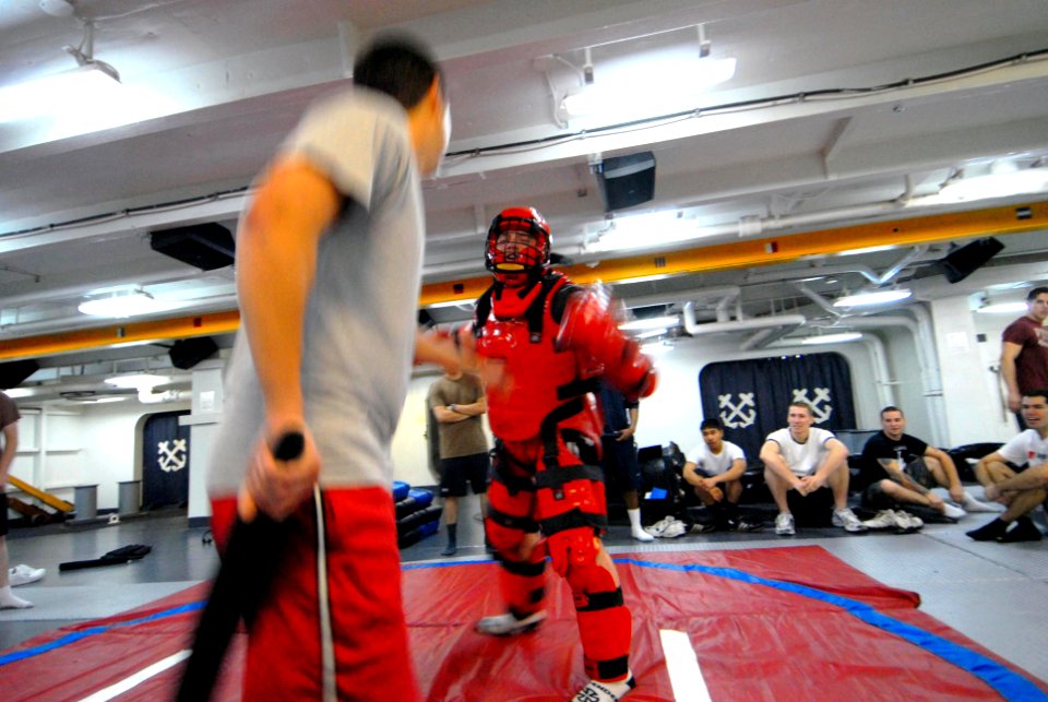 US Navy 070419-N-6326B-136 Master-at-Arms 3rd Class Joshua Albrecht taunts another security force member to simulate proper use of force aboard nuclear-powered aircraft carrier USS Nimitz (CVN 68)