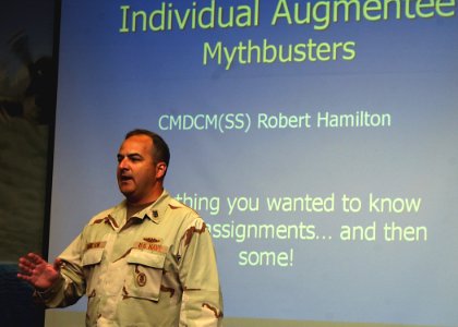 US Navy 070426-N-3285B-005 Command Master Chief (CMDCM) Robert A. Hamilton dispels Individual Augmentee (IA) myths during an IA Mythbuster conference held on board Naval Air Station Jacksonville