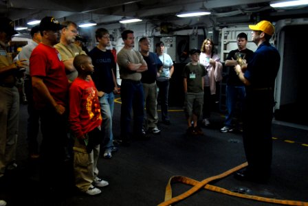 US Navy 070417-N-3659B-310 Chief Electronics Technician Andrew Belanger, a member of the Damage Control Training Team aboard USS Ronald Reagan (CVN 76), teaches shipboard fire fighting techniques to a group