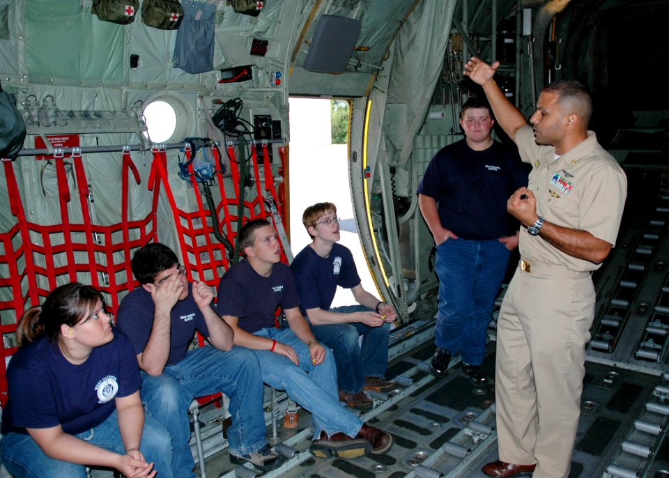 US Navy 070417-N-7427G-002 Naval Junior Reserve Officers Training Corps cadets of West Ouachita High School, Monroe, La., are given a tour of a C-2 cargo plane by Chief Aviation Electrician's Mate Rodolfo Lopez