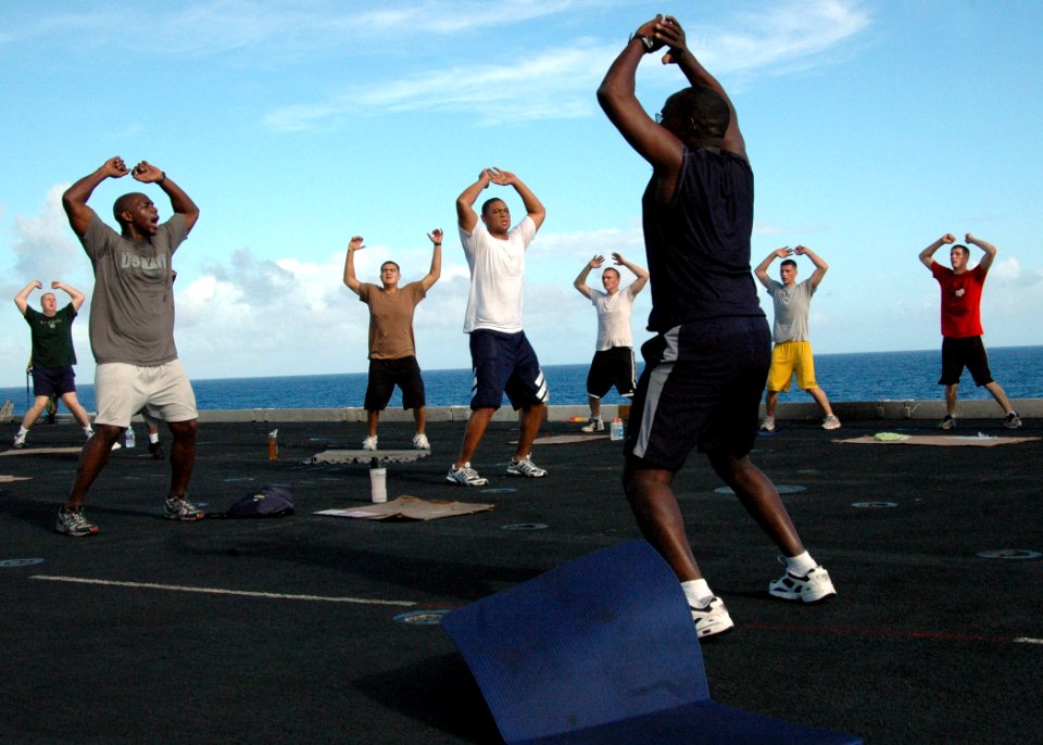 US Navy 070424-N-7128A-175 Sailors work on the flight deck during a no-fly day aboard nuclear-powered aircraft carrier USS Nimitz (CVN 68)