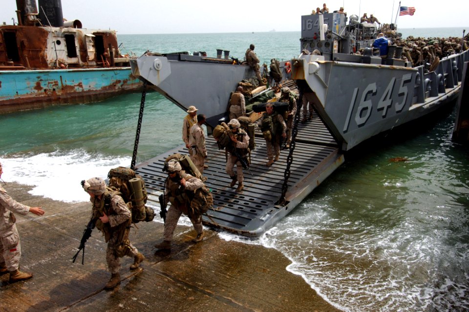 US Navy 070421-N-9818V-144 Marines attached to the 26th Marine Expeditionary Unit (MEU) based out of Camp Lejeune, N.C., disembark a landing craft utility (LCU) assigned to Assault Craft Unit (ACU) 2