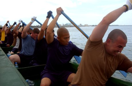 US Navy 070425-N-4198C-002 Personnel Specialist 1st Class Omar Saliba and Hospital Corpsman 1st Class Ryan De La Cruz lead the men's Navy rowing team