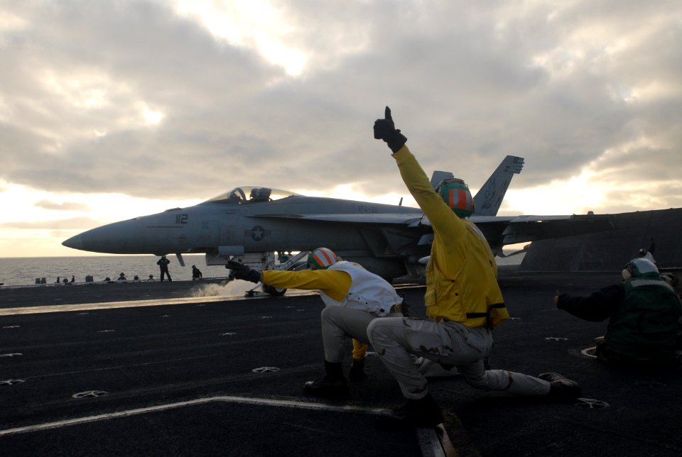 US Navy 070419-N-7730P-017 USS Ronald Reagan (CVN 76) Commanding Officer, Capt. Terry B. Kraft, launches an F-A-18E Super Hornet, assigned to the Fighting Redcocks of Strike Fighter Squadron (VFA) 22