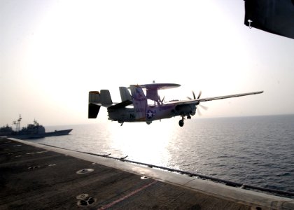 US Navy 070423-N-6854D-003 An E2-C Hawkeye, from the Tigertails of Carrier Airborne Early Warning Squadron (VAW) 125, launches from the flight deck of the Nimitz-class aircraft carrier USS Dwight D. Eisenhower (CVN 69)