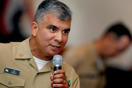 US Navy 070501-N-0696M-411 Master Chief Petty Officer of the Navy (MCPON) Joe R. Campa Jr. answers a Sailor's question during one of two all hands calls held at the Naval Station Norfolk base theater