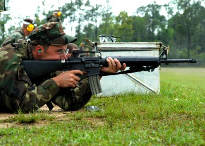 US Navy 070426-N-3857R-006 A Seabee attached to Naval Mobile Construction Battalion (NMCB) 1 takes dead aim on his target during M16E3 rifle qualifications held in Woolmarket