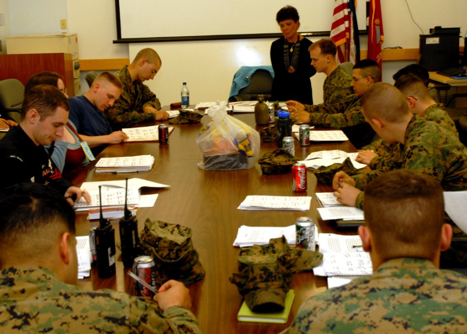 US Navy 070426-N-7656R-002 A Sailor and Marines prepare themselves for deployment by taking a social science and humanities class that focuses on the Arabic language and Middle Eastern culture