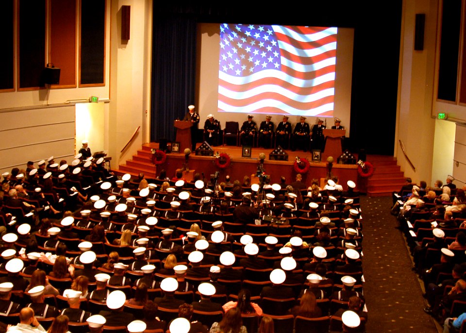 US Navy 070430-N-6247M-002 A memorial service is held in the base theater on Naval Air Station Whidbey Island in honor of three Explosive Ordnance Disposal Unit members that lost their lives in Iraq, April 6, 2007