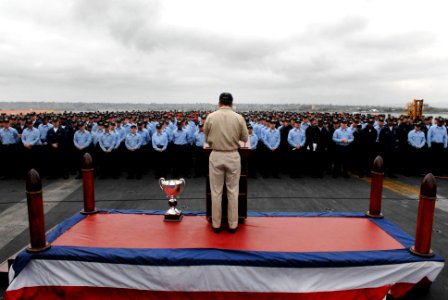 US Navy 070426-N-3659B-023 USS Ronald Reagan (CVN 76) Commanding Officer, Capt. Terry B. Kraft, addresses the crew during captain's call on the flight deck of Ronald Reagan