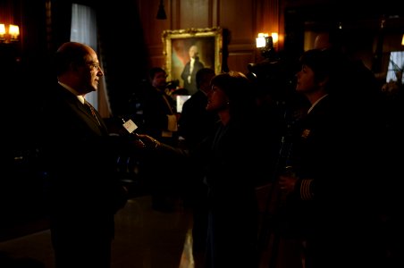 US Navy 070427-N-3642E-137 Secretary of the Navy (SECNAV), the Honorable Dr. Donald C. Winter interviews with Lila Lazarus, Fox News Detroit, during Navy League ceremony at the Detroit Athletic Club photo