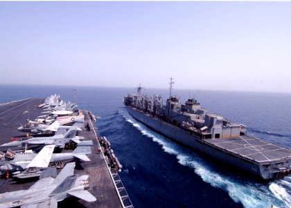 US Navy 070426-N-6854D-001 The fast combat support ship USNS Bridge (T-AOE 10) pulls alongside the Nimitz-class aircraft carrier USS Dwight D. Eisenhower (CVN 69) during an underway replenishment