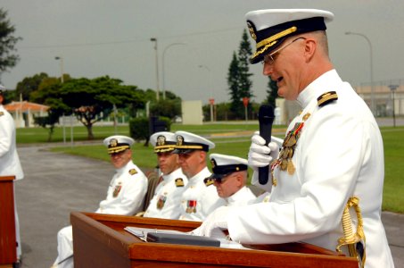 US Navy 070504-N-4198C-005 Commanding Officer Cmdr. Scott K. Higgins speaks during Naval Mobile Construction Battalion (NMCB) 3 change of command ceremony at Camp Shields