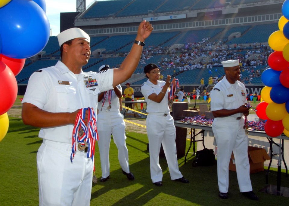 US Navy 070428-N-1522S-007 Naval Station Mayport Sailors cheer on children participating in the Let Us Play 2k Run at the Jacksonville Municipal Stadium