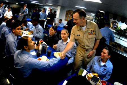 US Navy 070501-N-0696M-138 Chief of Naval Operations (CNO) Adm. Mike Mullen greets Sailors assigned to USS Wasp (LHD 1) on the mess decks of the multipurpose amphibious assault ship
