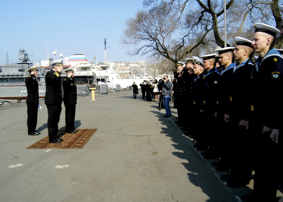 US Navy 070507-N-4649C-120 Cmdr. Thomas C. Halvorson, commanding officer of Arleigh Burke-class guided missile destroyer USS John S. McCain (DDG 56) reviews the Russian fleet as the ship arrived in Vladivostok, Russia