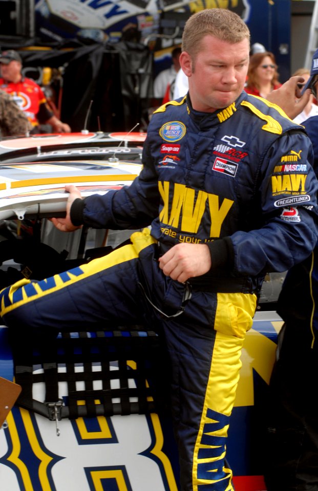 US Navy 070504-N-5345W-052 NASCAR Busch Series driver Shane Huffman climbs out of the ^88 U.S. Navy Chevy Monte Carlo after qualifying a career-high 3rd for the Circuit City 250 at Richmond International Raceway