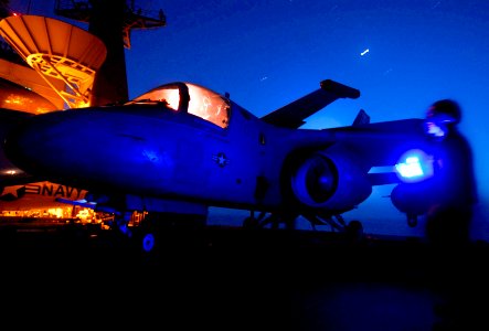 US Navy 070505-N-3729H-007 Airman Malcom Hines performs final preflight checks on an S-3B Viking, from the Top Cats of Sea Control Squadron (VS) 31, prior to flight operations