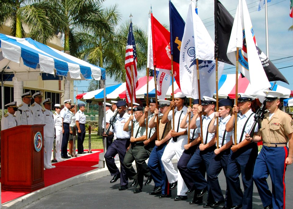 US Navy 070504-N-4779D-026 A multi-service flag detail presents the colors to the official party at the Joint Interagency Task Force (JIATF) South change of command ceremony