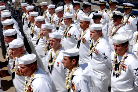 US Navy 070505-N-3642E-395 Sailors assigned to Pre-Commissioning Unit (PCU) Hawaii (SSN 776) prepare to man the ship, and officially bring the newest Virginia-class nuclear attack submarine to life