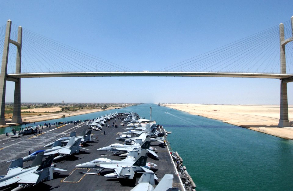 US Navy 070504-N-6854D-004 Nimitz-class aircraft carrier USS Dwight D. Eisenhower (CVN 69) travels under the Mubarak Peace Bridge while making her way through the Suez Canal