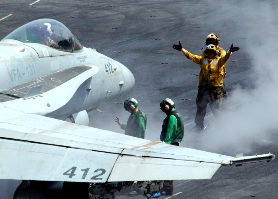 US Navy 070506-N-6854D-004 An F-A-18C Hornet, from the Wildcats of Strike Fighter Squadron (VFA) 131, prepares to launch from the flight deck of Nimitz-class aircraft carrier USS Dwight D. Eisenhower (CVN 69)
