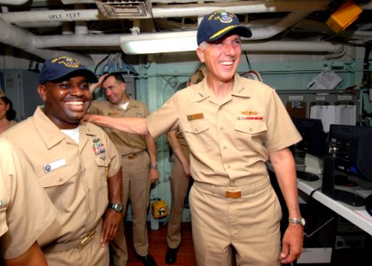 US Navy 070507-N-4965F-006 Commander, U.S. Third Fleet, Vice Adm. Samuel Locklear, greets Sailors assigned to Ticonderoga-class guided missile cruiser USS Port Royal (CG 73) during a tour of the ship at Naval Station Pearl Harb photo