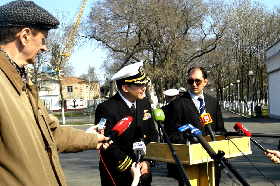 US Navy 070507-N-4649C-142 Cmdr. Thomas C. Halvorson, commanding officer of Arleigh Burke-class guided missile destroyer USS John S. McCain (DDG 56) greets the local media after the ship arrived in Vladivostok, Russia