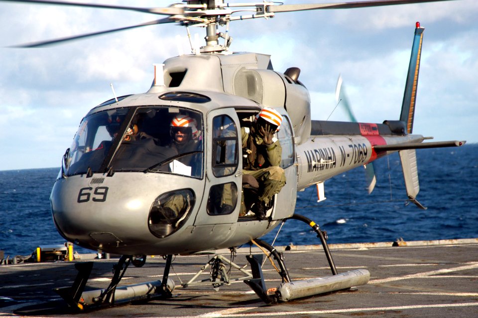 US Navy 070505-N-7029R-061 Crewmembers from a Brazilian navy helicopter prepare to take off from USS Pearl Harbor (LSD 52) during UNITAS exercises