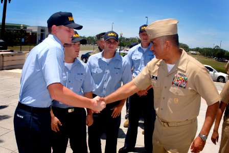 US Navy 070509-N-0696M-301 Master Chief Petty Officer of the Navy (MCPON), Joe R. Campa Jr., greets Sailors outside the Naval Air Station Pensacola galley during a visit to the base