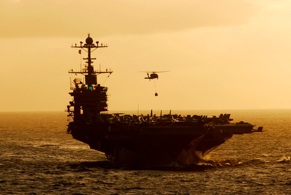 US Navy 070515-N-9928E-044 An MH-60S Seahawk assigned to the Wild Cards of Helicopter Sea Combat Squadron (HSC) 23 delivers supplies